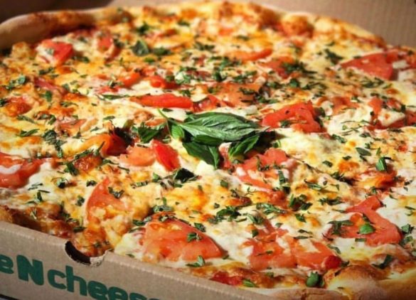 basil tomato pizza with chees and sauce at Sauce N Cheese